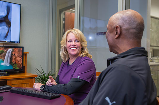 talking to patient about treatment
